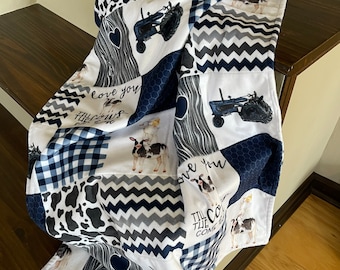Minky soft baby blanket in blue and white with farm animals
