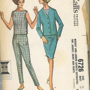 May include: Vintage McCall's sewing pattern featuring illustrations of two women in 1960s outfits. One model wears a plaid top and pants, the other a blue jacket and skirt. The pattern includes instructions for a top, jacket, skirt, and pants.