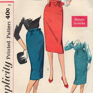 May include: A vintage Simplicity sewing pattern showing three pencil skirt designs. The pattern includes measurements for a 66 cm waist and 91 cm hips. The text "Simple to make" is visible.