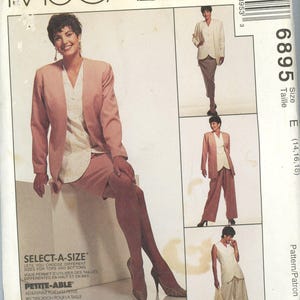 May include: McCall's sewing pattern envelope featuring a woman in a pink suit with a white blouse. The envelope includes multiple images of the suit in different styles. Text on the envelope reads "Select-A-Size" and "Easy Non-Stop Wardrobe".