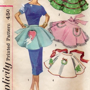 May include: Vintage Simplicity pattern 1846 featuring a woman in a blue dress and three apron designs. The aprons include a green floral, pink with lace, and white with Christmas motifs. The pattern is marked "One Size" and "Printed Pattern 45c".