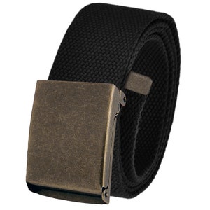 May include: A black canvas belt with an antique brass buckle. The belt is rolled up and the buckle is closed.