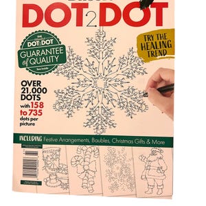 May include: A Blissful Dot 2 Dot magazine with a snowflake dot-to-dot puzzle on the cover. The cover also features the text "Try the Healing Trend" and "Guarantee of Quality". The magazine includes festive arrangements and Christmas gifts.