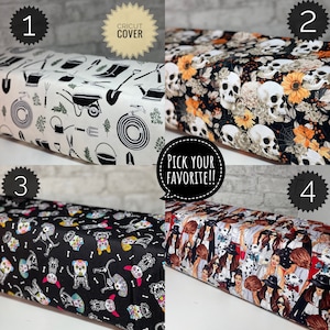 May include: Four different Cricut machine cover designs. The first design features a white background with black gardening tools and plants. The second design features a black background with white skulls and flowers. The third design features a black background with white sugar skulls and bones. The fourth design features a white background with a colorful illustration of women wearing hats and sunglasses.