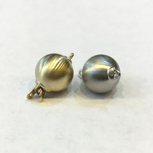 One lovely 14K gold matt ball safety clasp