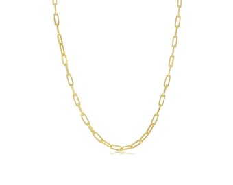 May include: A gold chain necklace with a delicate, linked chain design.