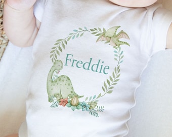 Personalised Baby sleepsuit, bib and vest, New Baby Gift Set, Dinosaur Weath and name