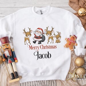 Personalised Christmas Jumper For Children.  White Cotton Sweatshirt - Santa and Reindeer Graphics