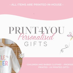 a white shirt with a pink flower on it and the words print4you personal