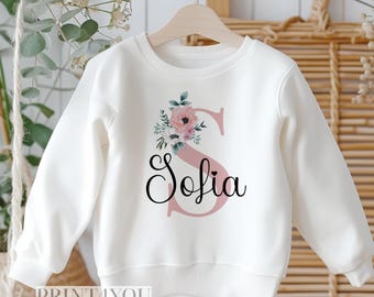 Personalisierte Sweatshirt Pullover für Kinder.  Weißes Baumwoll Sweatshirt - Rosa Blumen Alphabet Buchstabe