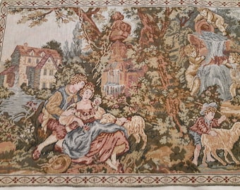 May include: A tapestry depicting a pastoral scene with a couple sitting under a tree, a small cottage in the background, and a waterfall with cherubs playing in the water.