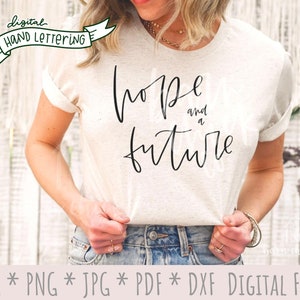 May include: A white t-shirt with black text that reads "hope and a future".