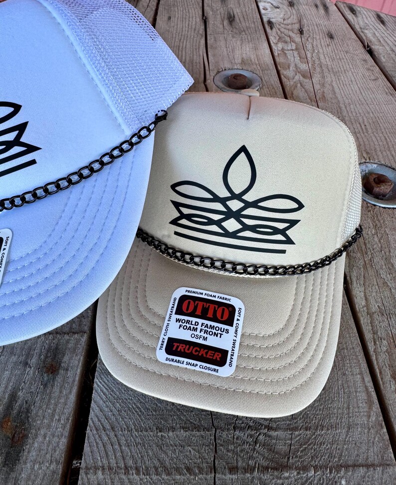 Tan Otto foam trucker hat with black western boot stitch graphic and decorative chain