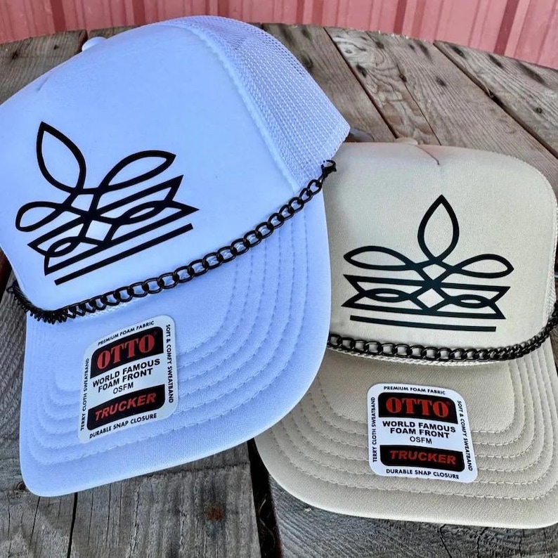 White and tan cowgirl trucker hats with black western boot stitch design and chain