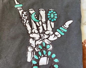 Turquoise Skeleton Hand Graphic Tee - Trendy Western Fashion for Women
