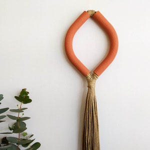 Large wall tassel, ceramic like and hemp twine modern minimalist wall decor, decorative faux terra cotta wall sculpture, fibre art object