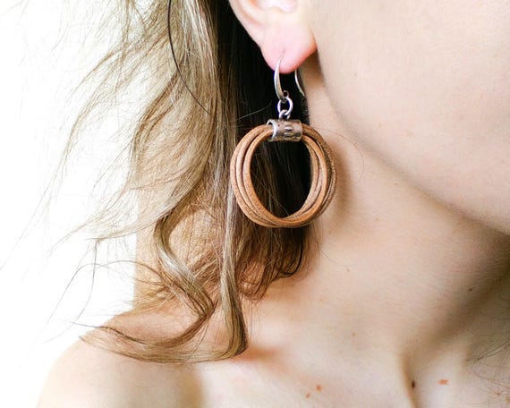 Leather and cheap metal earrings