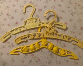 Three Vintage Child's Yellow Bambi Deer, Clown, Duck Clothes Coat Hangers