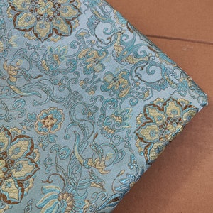 Light  blue  color brocade fabric with golden flower style fabric, jacket dress fabric, cosplay dress fabric, fabric by 1/2 yards