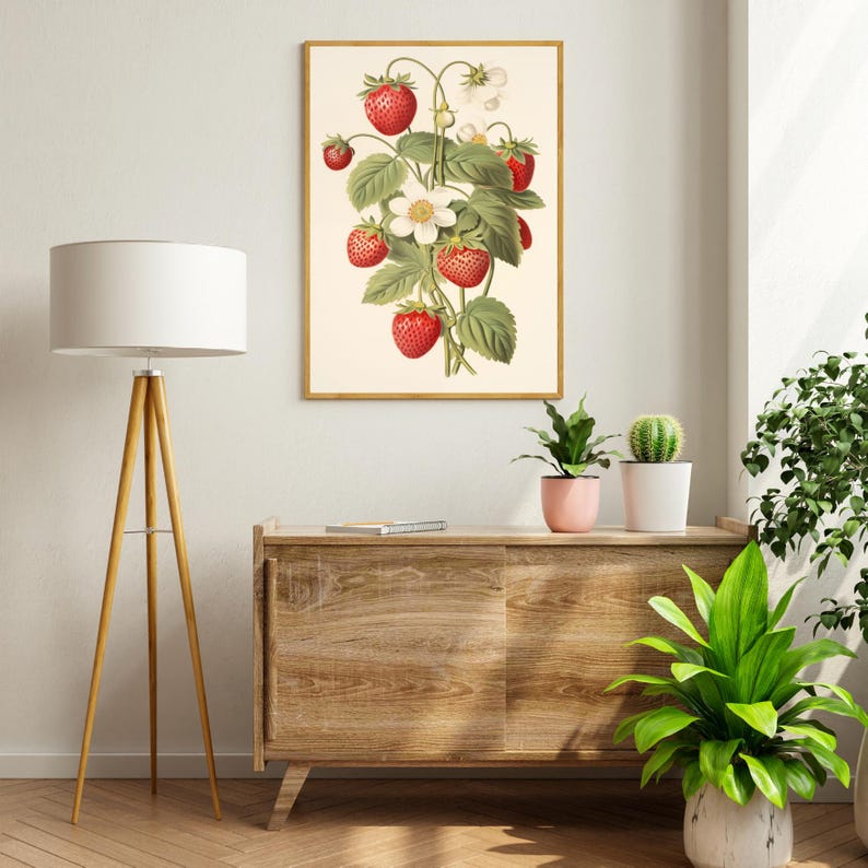 May include: A framed botanical illustration of a strawberry plant with red ripe strawberries and white flowers.