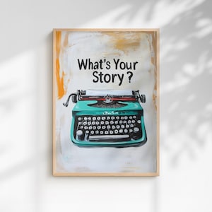May include: A framed print featuring a vintage teal typewriter with a red ribbon and black keys. The text "What's Your Story?" is above the typewriter. The background has a textured, abstract design with orange and white brushstrokes.