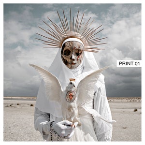 May include: A surreal image of a figure in a white habit and a skull mask, adorned with a gold halo. The figure holds a white dove with a heart pendant. The text "PRINT 01" is visible.