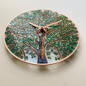 Tree of Life glass wall clock viewed from above, handcrafted green tree design, decorative nature wall clock, unique handmade home decor