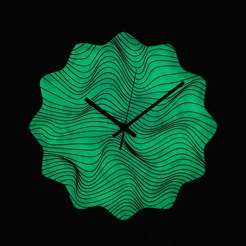 Eye-catching glow-in-the-dark wall clock featuring hand-painted magic waves. This oversized gothic art clock with black finishing adds a mystical touch to your home decor, perfect for bohemian and eclectic styles. Unusual clock. Oversized wall clock.