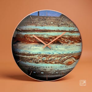 Handmade Jupiter glass wall clock with copper hands, oversized celestial wall decor for modern interiors