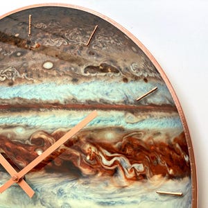 Oversize wall clock. Jupiter large wall clock with glowing astronomy symbols and minimalist design. Great for space-themed rooms, modern living spaces, and offices. Ideal gift for those under the Sagittarius zodiac or astronomy enthusiasts.