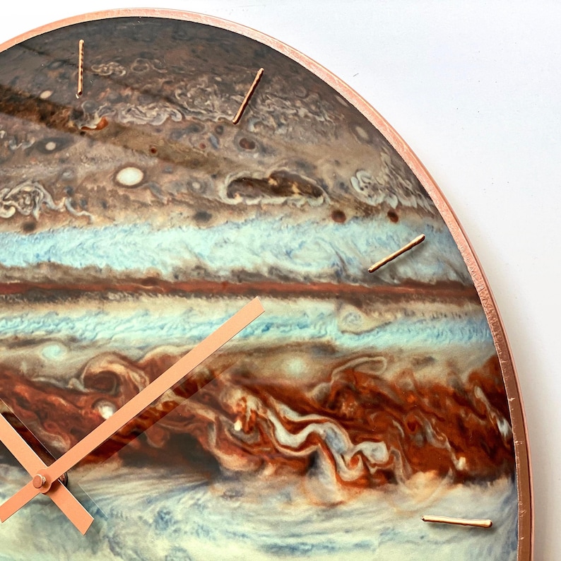 Oversize wall clock. Jupiter large wall clock with glowing astronomy symbols and minimalist design. Great for space-themed rooms, modern living spaces, and offices. Ideal gift for those under the Sagittarius zodiac or astronomy enthusiasts.