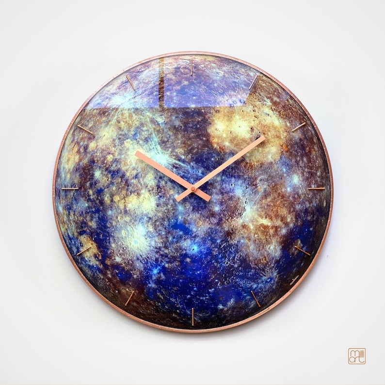 Astronomy-themed Mercury clock, glowing softly in the dark. This hand-painted glass clock brings a celestial vibe to any room. Perfect for modern interiors, yoga studios, or as a zodiac gift for Gemini and Virgo.