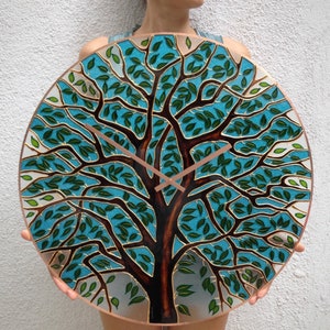 Modern summer tree wall clock with a colorful hand-painted design. This large stained glass clock adds a touch of nature and art to any room, perfect for nature lovers or those with bright, contemporary decor.