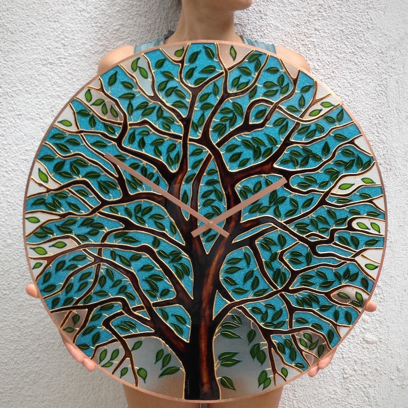 Modern summer tree wall clock with a colorful hand-painted design. This large stained glass clock adds a touch of nature and art to any room, perfect for nature lovers or those with bright, contemporary decor.