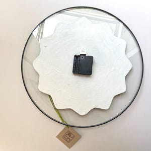 Captivating glow-in-the-dark wall clock, meticulously hand-painted with magical waves. Its oversized design and gothic aesthetic with black finishing create a perfect focal point for boho-inspired interior. Unusual clock. Large clock. Quirky clock.