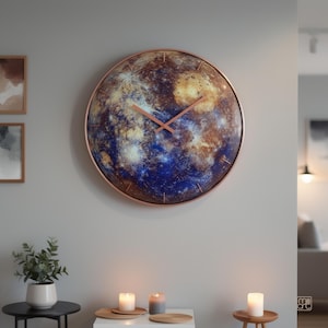Mercury glass wall clock displayed on a neutral interior wall above a small table, showing how the colorful celestial clock looks as home decor.