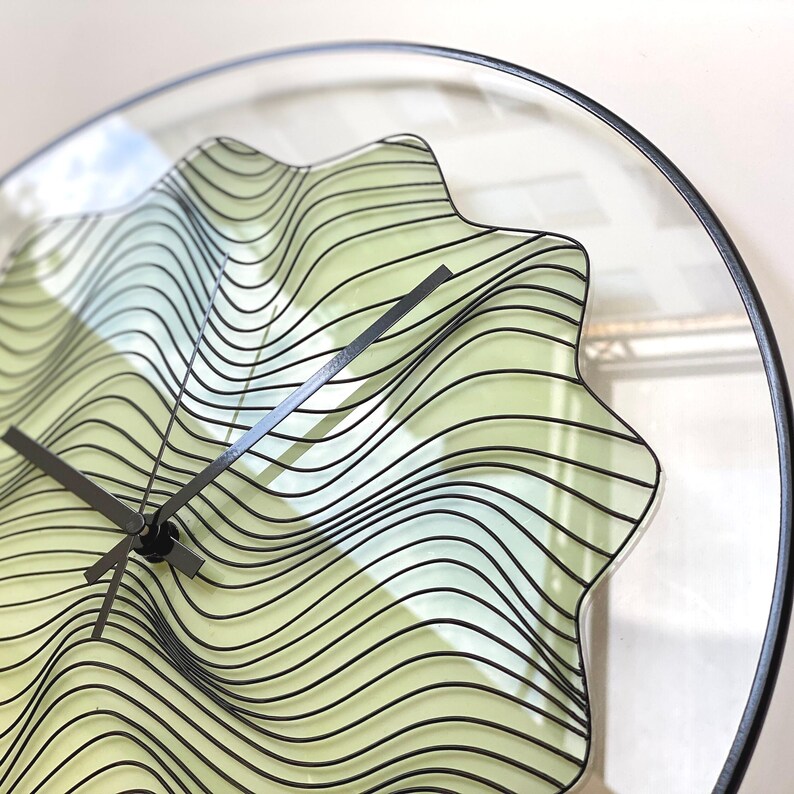 Enchanting hand-painted wall clock that glows in the dark. With a gothic design and black finishing, this oversized clock showcases beautiful magic waves, making it a perfect piece for those seeking unique boho decor. Unusual  clock. Quirky clock.