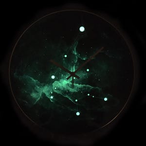 Eye-catching Aquarius constellation clock, designed for modern interiors. This glow-in-the-dark clock adds a cosmic touch to your home decor, ideal for gifting to Aquarius individuals and astrology fans.