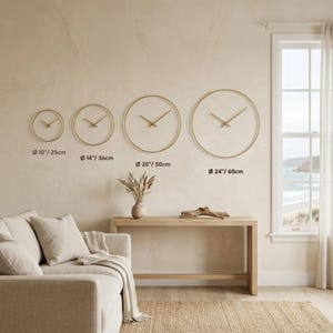 Available sizes for Tree of Life oversized wall clock shown in modern living room interior for home wall decor inspiration