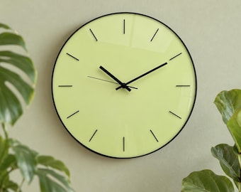 Glowing Glass Wall Clock in Minimalist Pale Green: Unusual Wall Clocks
