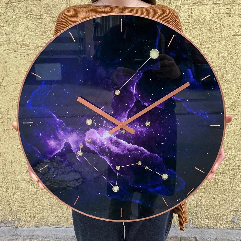 Beautifully crafted Aquarius wall clock with glowing elements. Perfect for home decor, this oversized clock combines functionality with artistic style, making it a unique gift for astrology lovers. Oversized wall clock. Large wall clock. Big clock.