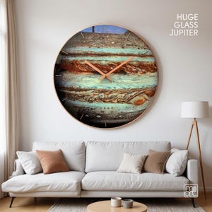 Large Jupiter planet wall clock displayed in modern living room interior as boho wall art