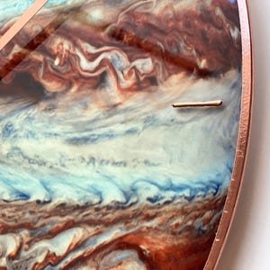 Large Wall Clock. Celestial Jupiter oversized clock for astronomy lovers and astrology fans. This hand-painted glass clock adds an elegant, cosmic vibe to yoga studios, meditation spaces, or home offices. A perfect gift for Sagittarius and Pisces.