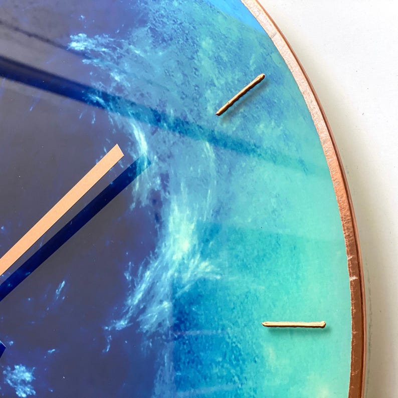 Large Neptune glow clock that combines elegance with cosmic charm. This unique wall clock highlights the Pisces sign while enhancing your space with stunning decor, making it a perfect gift for astrology fans. Unusual wall clock. Blue accent decor.