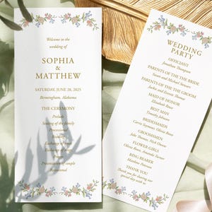 May include: Two wedding ceremony programs with floral borders. The programs display the names "SOPHIA & MATTHEW" and "WEDDING PARTY" with event details. A gold leaf and a ribbon are also in the image, set against a green and white backdrop.