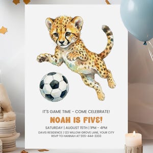 May include: A white invitation card with a watercolor illustration of a cheetah cub and a soccer ball. The text reads "NOAH IS FIVE!" with event details: date, time, and location.