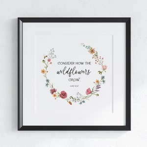 May include: A framed print featuring a watercolour illustration of a wreath of wildflowers and the text "Consider how the wildflowers grow. Luke 12:27"
