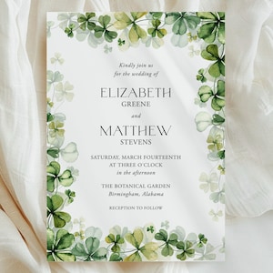 May include: Wedding invitation with a shamrock border in various shades of green. The text reads "Kindly join us for the wedding of ELIZABETH GREENE and MATTHEW STEVENS", with the date, time, and location details.