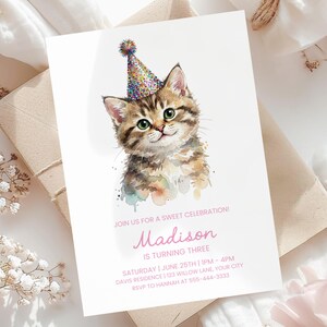 May include: A white invitation card features a watercolor illustration of a kitten wearing a party hat. The text reads "Join us for a sweet celebration! Madison is turning three." Additional details include the date, time, and RSVP information.