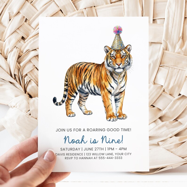 May include: A birthday invitation featuring a watercolor illustration of a tiger wearing a party hat. The invitation reads "Noah is Nine!" with event details. The tiger is orange and black.